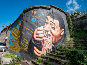 Gragnano, Naples, Italy - march 8 2020: mural of Totò Antonio De Curtis, nicknamed il Principe della risata (the Prince of laughter), Italian actor, comedian, writer, poet, singer and lyricist. Mural design in the city of pasta